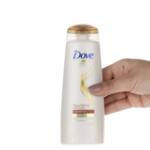 شامپو موهای خشک و زبر داو مدل Oil Care حجم ۲۰۰ میلی لیتر